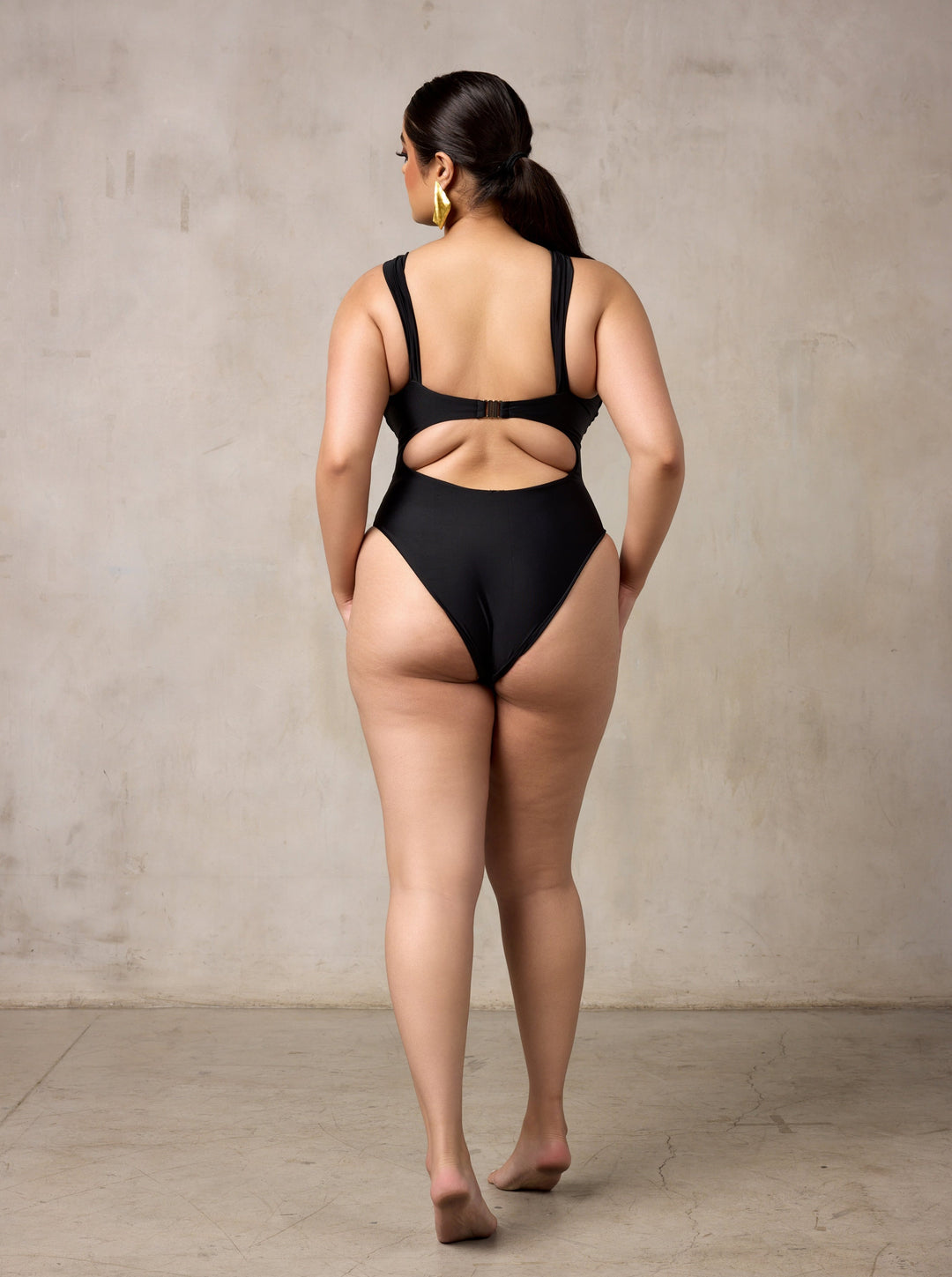 MBM Swim by Marcia B Maxwell black one-piece swimsuit monokini on model #color_black