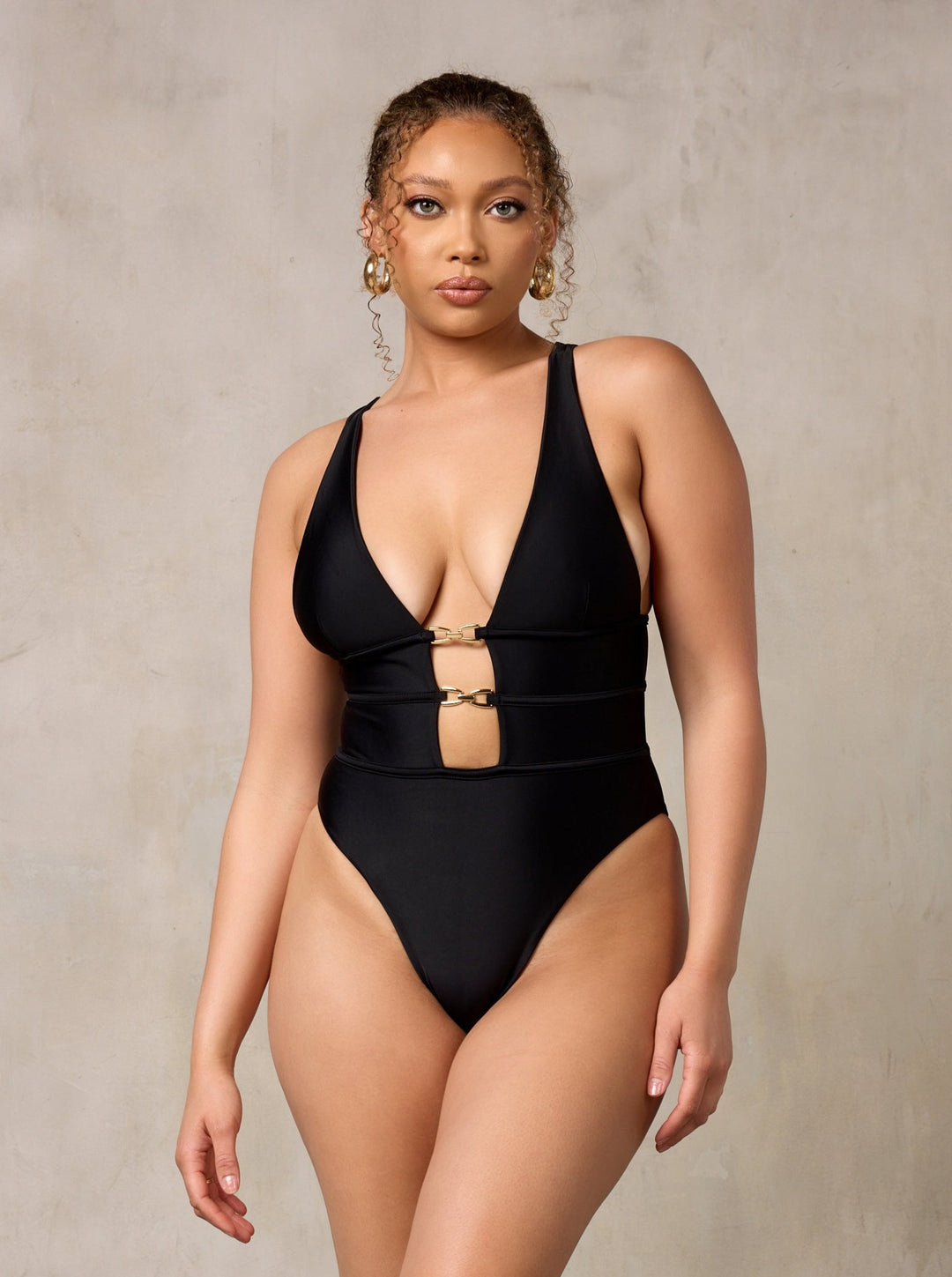 MBM Swim by Marcia B Maxwell black asymmetrical one-piece swimsuit monokini on model #color_black
