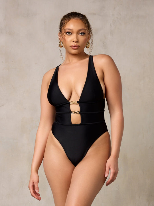 MBM Swim by Marcia B Maxwell black asymmetrical one-piece swimsuit monokini on model #color_black