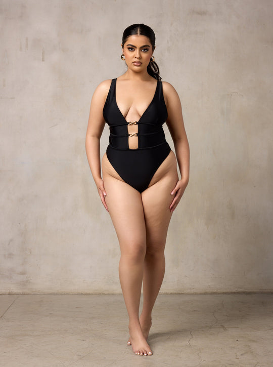 MBM Swim by Marcia B Maxwell black asymmetrical one-piece swimsuit monokini on model #color_black