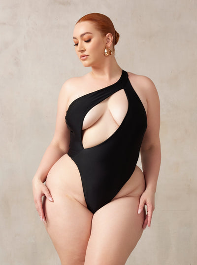 MBM Swim by Marcia B Maxwell one-piece one shoulder black swimsuit on Curve midsize model #color_black