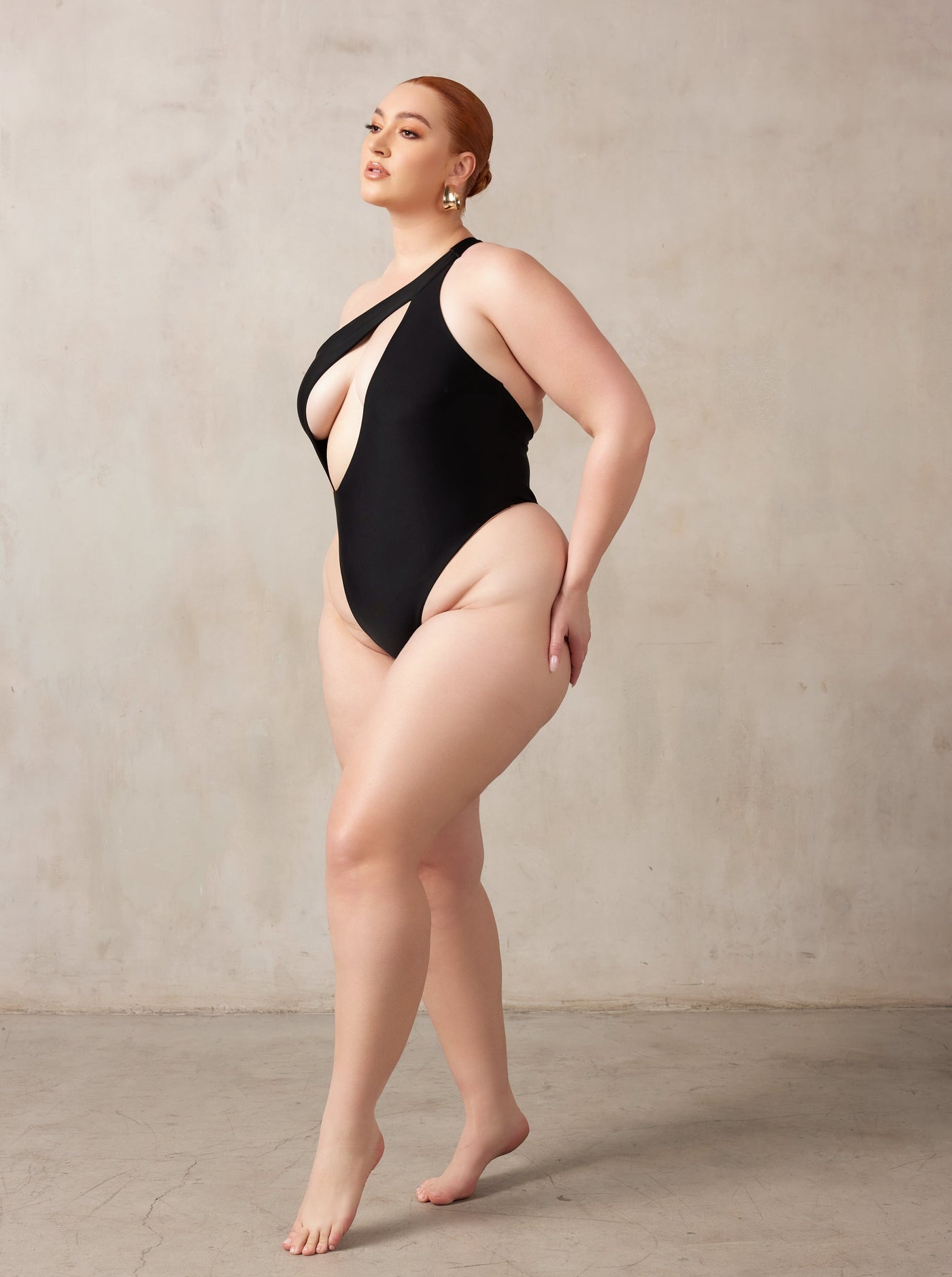 MBM Swim by Marcia B Maxwell one-piece one shoulder black swimsuit on Curve midsize model #color_black
