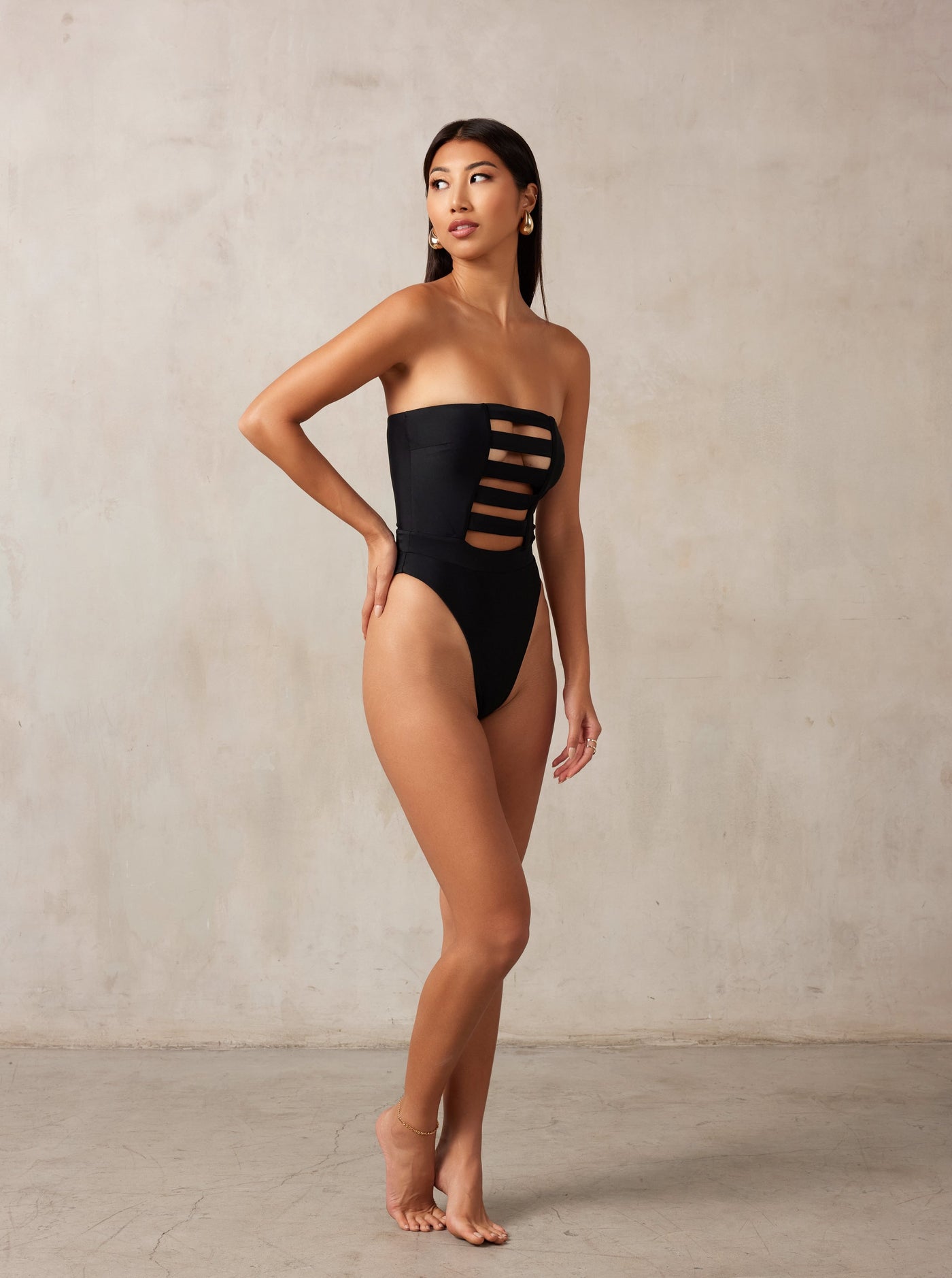 MBM Swim, Marcia B Maxwell high-cut Black cut-out one-piece swimsuit on beautiful asian model, black owned #color_black