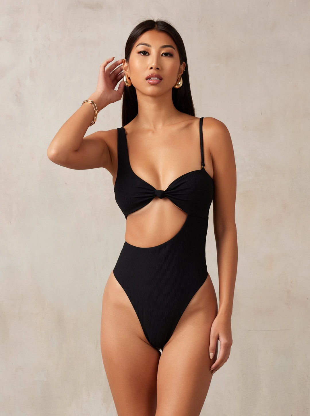 MBM Swim by Marcia B Maxwell ribbed black asymmetrical one-piece swimsuit monokini on model #color_black