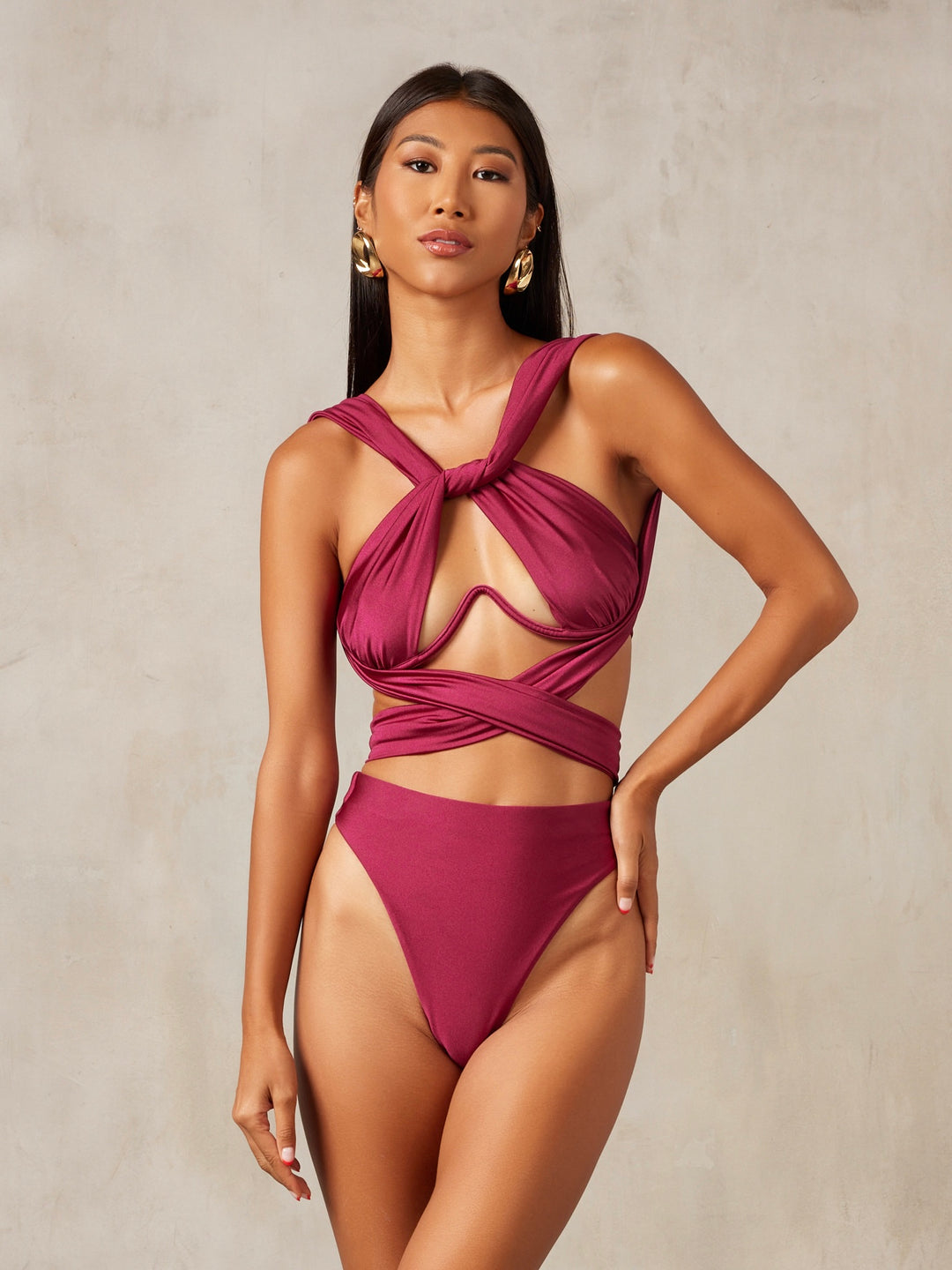 MBM Swim by Marcia B Maxwell model wearing multiway Bella bikini top and Passion bottoms in berry burgundy #color_berry