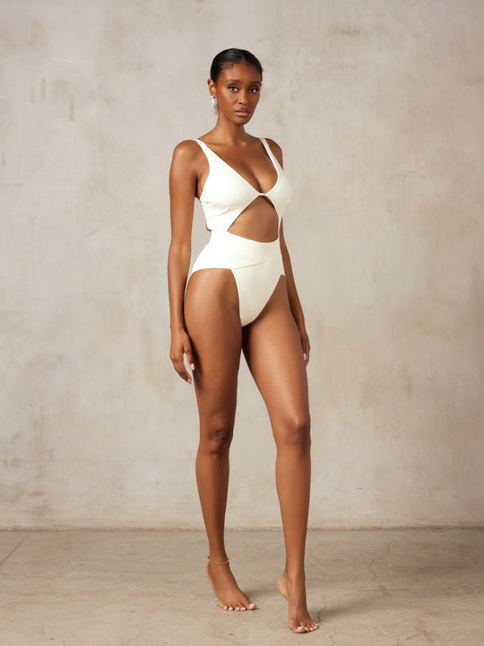 MBM swim by Marcia B Maxwell white ivory cream One-piece swimsuit on Indian model #color_cream