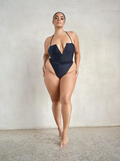 MBM Swim by Marcia B Maxwell black Karma one-piece thong swimsuit monokini on plus size model #color_black