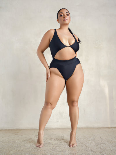 Curvy plus size curve model wearing MBM Swim by Marcia B Maxwell black Aspire one-piece monokini #color_black