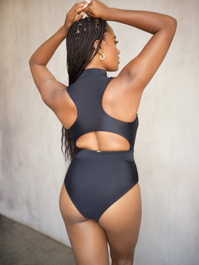 MBM swim by Marcia B Maxwell Dream Black one-piece monokini swimsuit with zipper on black model #color_black